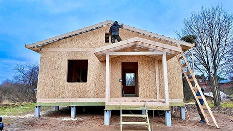 Dad builds a house